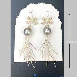 Silver Tone Dangling Pearl  and Bow Earrings